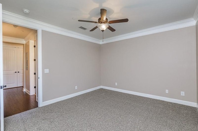 991 Westhaven Blvd Unit 32, Franklin, TN 37064 - empty room with dark colored carpet, ceiling fan, crown molding, and a smoke detector