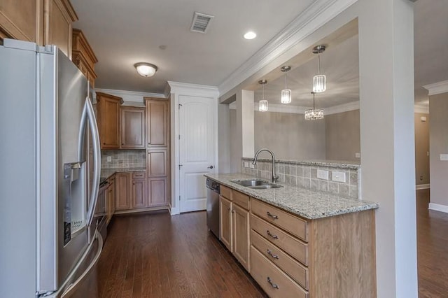 991 Westhaven Blvd Unit 32, Franklin, TN 37064 - kitchen with appliances with stainless steel finishes, tasteful backsplash, crown molding, light stone counters, and dark wood-style floors