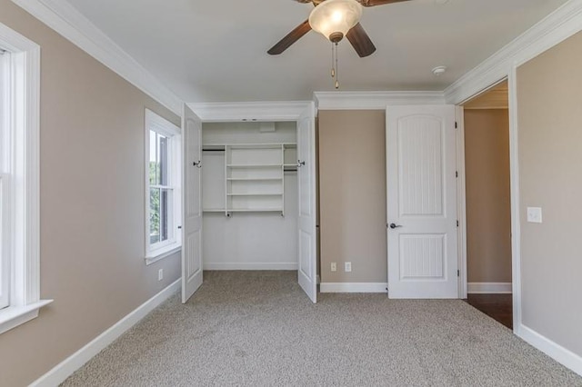 991 Westhaven Blvd Unit 32, Franklin, TN 37064 - unfurnished bedroom with carpet flooring, ornamental molding, a ceiling fan, and a closet