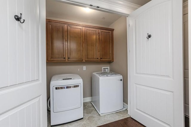 991 Westhaven Blvd Unit 32, Franklin, TN 37064 - laundry area with cabinet space and separate washer and dryer