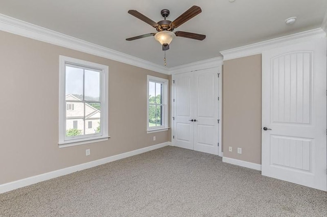 991 Westhaven Blvd Unit 32, Franklin, TN 37064 - unfurnished bedroom with crown molding, carpet flooring, a closet, and ceiling fan