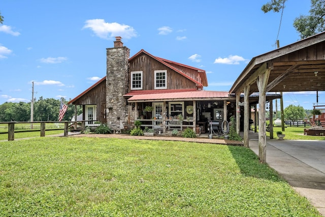 540 Powell Hollow Rd, Tullahoma, TN 37388 - rear view of house featuring a chimney