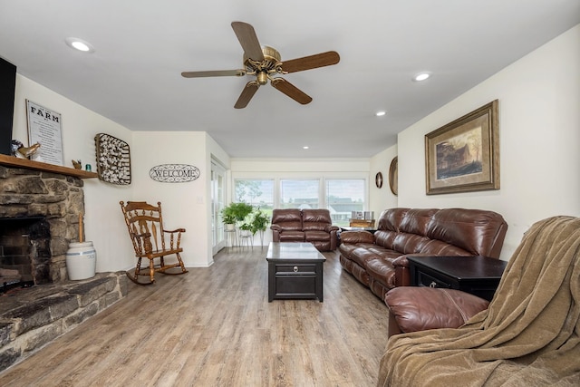 540 Powell Hollow Rd, Tullahoma, TN 37388 - living room with a ceiling fan, light wood finished floors, recessed lighting, and a stone fireplace