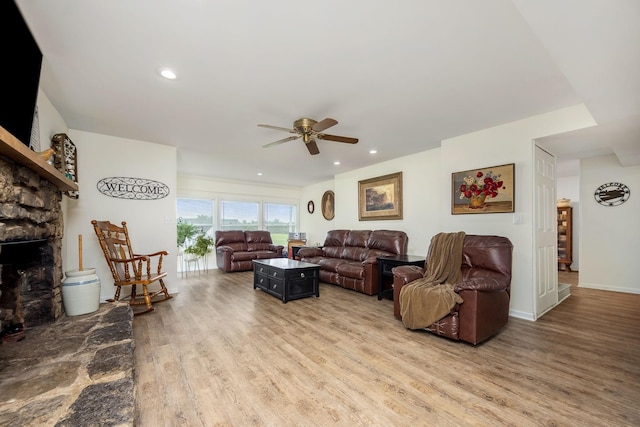 540 Powell Hollow Rd, Tullahoma, TN 37388 - living room featuring light wood-style floors, ceiling fan, a fireplace, and recessed lighting