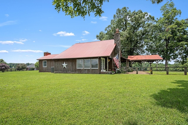 540 Powell Hollow Rd, Tullahoma, TN 37388 - view of front of home with a chimney and a metal roof