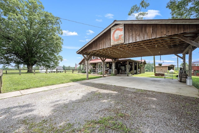 540 Powell Hollow Rd, Tullahoma, TN 37388 - view of property's community featuring driveway, a detached carport, and an outdoor structure