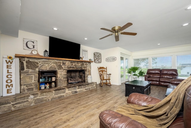 540 Powell Hollow Rd, Tullahoma, TN 37388 - living area with a stone fireplace, a ceiling fan, plenty of natural light, wood finished floors, and recessed lighting