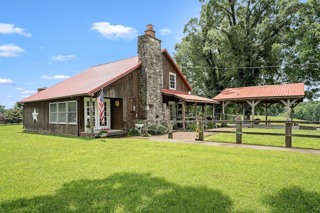 540 Powell Hollow Rd, Tullahoma, TN 37388 - view of front of home with a chimney, a metal roof, and a gazebo