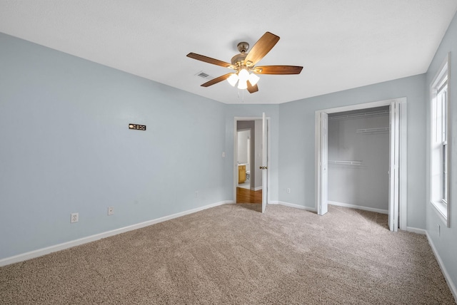 529 Southwind Dr, Hopkinsville, KY 42240 - unfurnished bedroom with light colored carpet, a closet, and ceiling fan