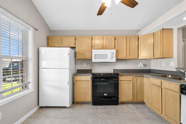 529 Southwind Dr, Hopkinsville, KY 42240 - kitchen featuring white appliances, lofted ceiling, light brown cabinetry, dark countertops, and healthy amount of natural light
