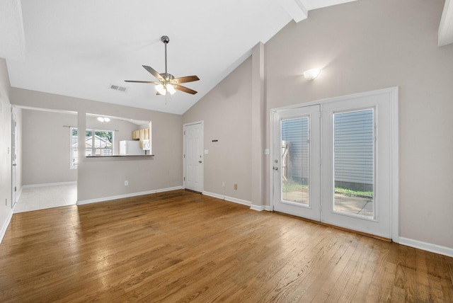529 Southwind Dr, Hopkinsville, KY 42240 - unfurnished living room with ceiling fan, wood finished floors, high vaulted ceiling, and beamed ceiling