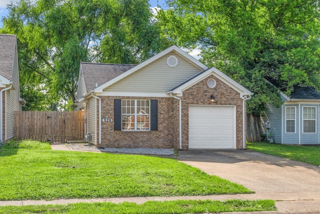 529 Southwind Dr, Hopkinsville, KY 42240 - view of front of home with a garage, driveway, and brick siding