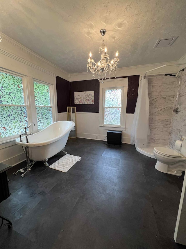 2016 Tennessee St, Westpoint, TN 38486 - bathroom with a chandelier, ornamental molding, a stall shower, and a freestanding bath