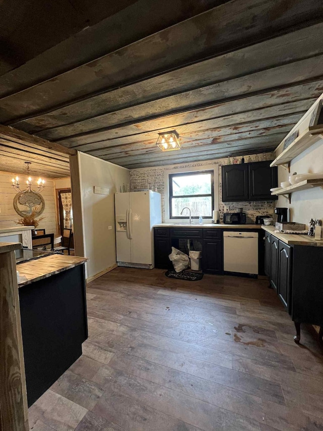 2016 Tennessee St, Westpoint, TN 38486 - kitchen with white appliances, dark wood-style floors, dark cabinets, wooden counters, and open shelves