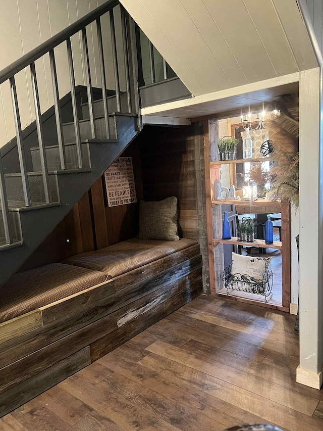 2016 Tennessee St, Westpoint, TN 38486 - staircase featuring hardwood / wood-style floors and wood walls