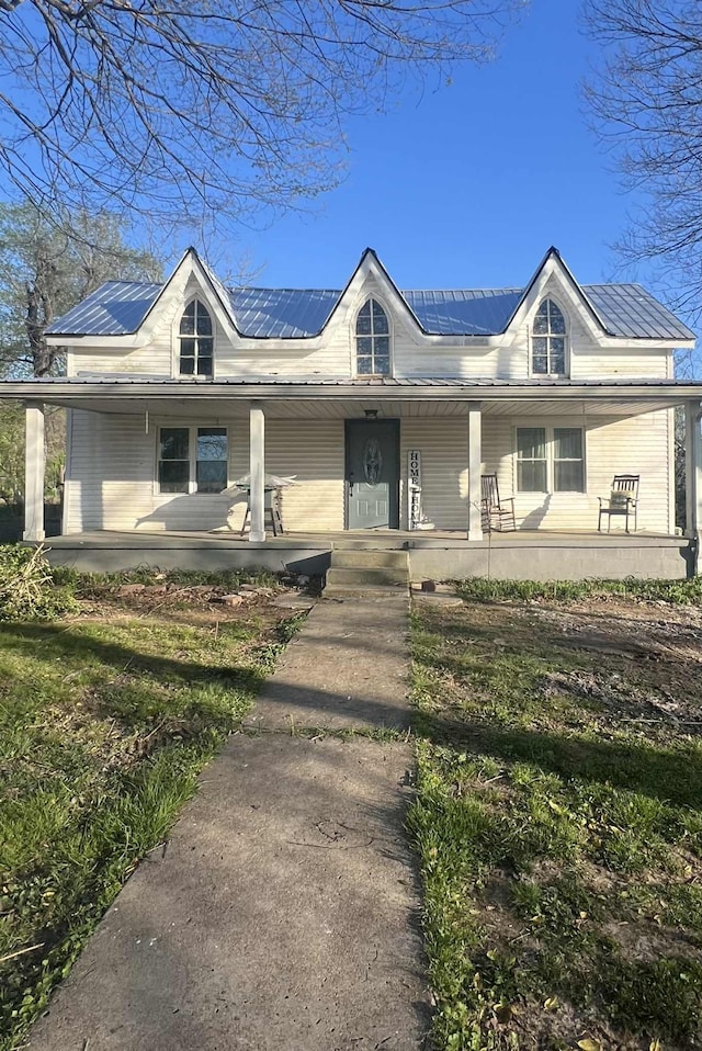 2016 Tennessee St, Westpoint, TN 38486 - view of front facade with a porch and a metal roof