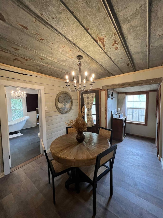 2016 Tennessee St, Westpoint, TN 38486 - dining space with a chandelier, hardwood / wood-style floors, and wooden walls