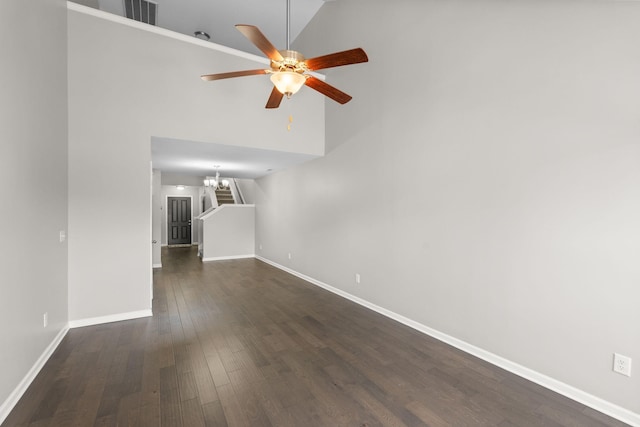5538 Hamilton Cir, Antioch, TN 37013 - unfurnished living room with ceiling fan, a chandelier, dark wood finished floors, and high vaulted ceiling