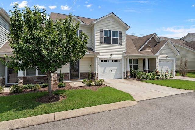 5538 Hamilton Cir, Antioch, TN 37013 - craftsman-style home with driveway, a front lawn, and stone siding