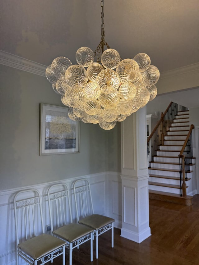 1413 Station Four Ln, Old Hickory, TN 37138 - detailed view of wood finished floors, crown molding, a wainscoted wall, and a chandelier