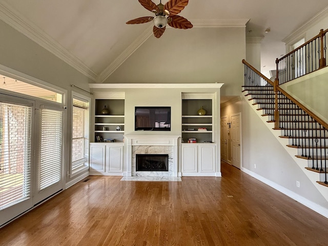 1413 Station Four Ln, Old Hickory, TN 37138 - unfurnished living room featuring high vaulted ceiling, ceiling fan, a premium fireplace, wood finished floors, and built in shelves
