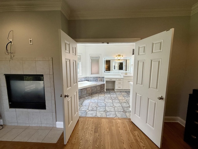 1413 Station Four Ln, Old Hickory, TN 37138 - bathroom with crown molding, a bath, vanity, and wood finished floors
