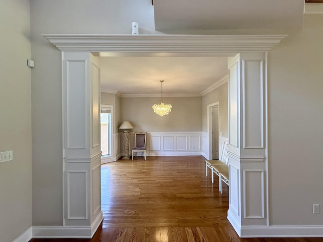 1413 Station Four Ln, Old Hickory, TN 37138 - hallway with dark wood-style flooring, crown molding, a chandelier, a decorative wall, and wainscoting