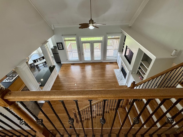1413 Station Four Ln, Old Hickory, TN 37138 - stairway with ceiling fan, crown molding, wood finished floors, and a fireplace with flush hearth