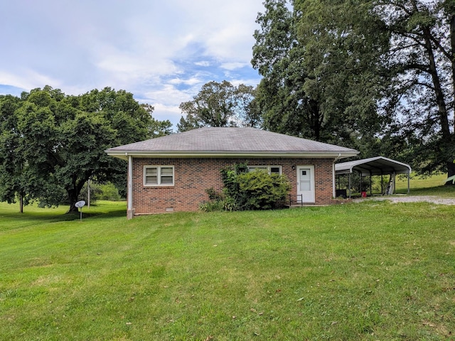 3007 Green Hill Dr, Centerville, TN 37033 - view of front of house with a front lawn, brick siding, a carport, and driveway