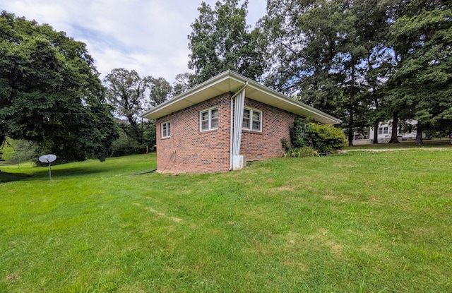 3007 Green Hill Dr, Centerville, TN 37033 - view of home's exterior with brick siding, a yard, and crawl space