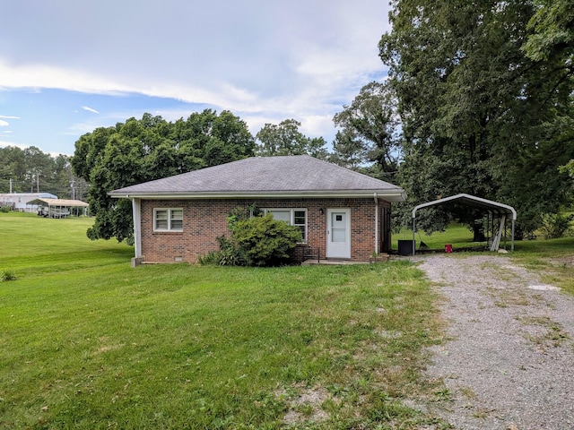 3007 Green Hill Dr, Centerville, TN 37033 - view of front of property with a carport, a front lawn, gravel driveway, and brick siding
