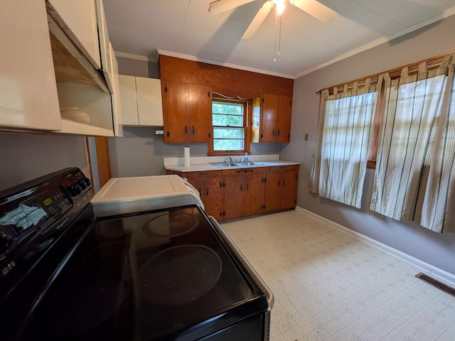 3007 Green Hill Dr, Centerville, TN 37033 - kitchen featuring electric stove, crown molding, brown cabinets, light flooring, and ceiling fan