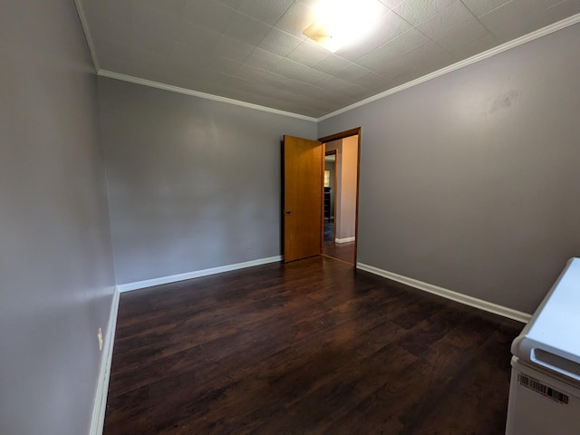 3007 Green Hill Dr, Centerville, TN 37033 - unfurnished room featuring dark wood-type flooring and crown molding