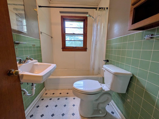 3007 Green Hill Dr, Centerville, TN 37033 - bathroom featuring tile walls, shower / bath combination with curtain, tile patterned floors, and a wainscoted wall