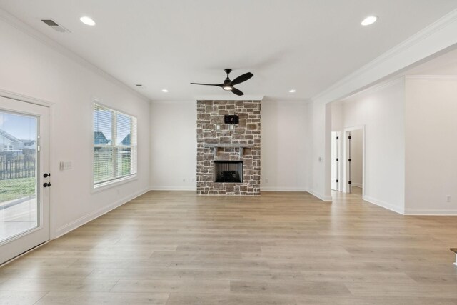 4118 Maples Farm Dr, Murfreesboro, TN 37127 - unfurnished living room featuring ornamental molding, a ceiling fan, light wood finished floors, a stone fireplace, and recessed lighting