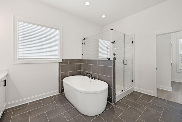 4118 Maples Farm Dr, Murfreesboro, TN 37127 - full bathroom featuring tile patterned floors, a freestanding bath, vanity, a shower stall, and healthy amount of natural light