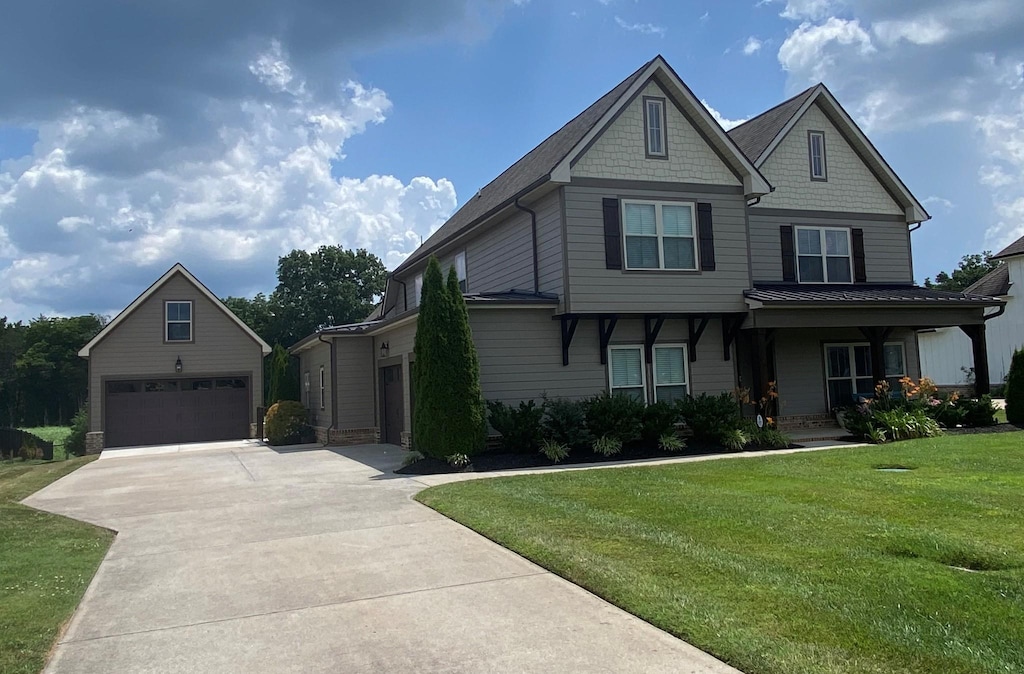 2090 Trout Trl, Murfreesboro, TN 37129 - craftsman-style house featuring a front lawn, a detached garage, and concrete driveway