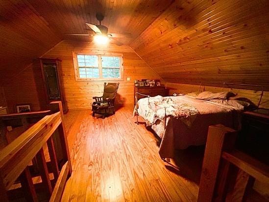 2933 Vanzant Bend Rd, Belvidere, TN 37306 - bedroom featuring wood finished floors, wooden walls, wood ceiling, and vaulted ceiling