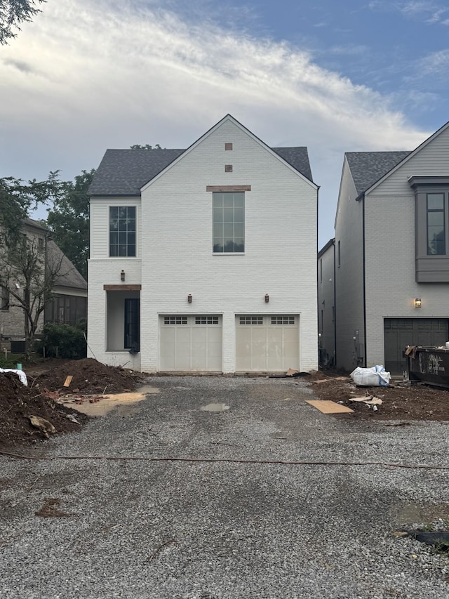 4155 Outer Dr, Nashville, TN 37204 - view of side of home featuring a garage and asphalt driveway
