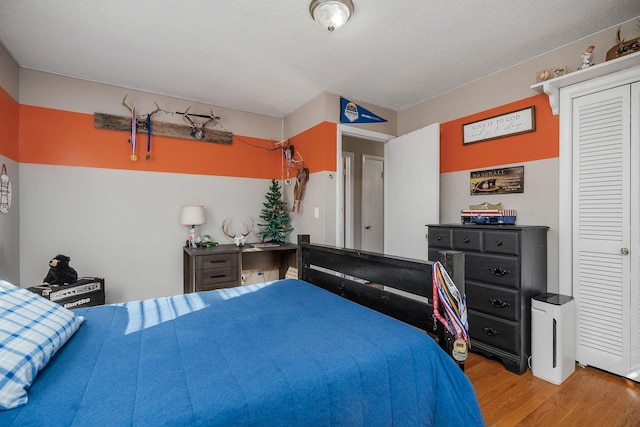 6191 Baxter Rd, Baxter, TN 38544 - bedroom featuring light wood-type flooring and a closet