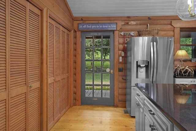 1261 S Cedar Ln, Chickamauga, GA 30707 - kitchen featuring stainless steel refrigerator with ice dispenser, light wood-type flooring, and dark stone counters