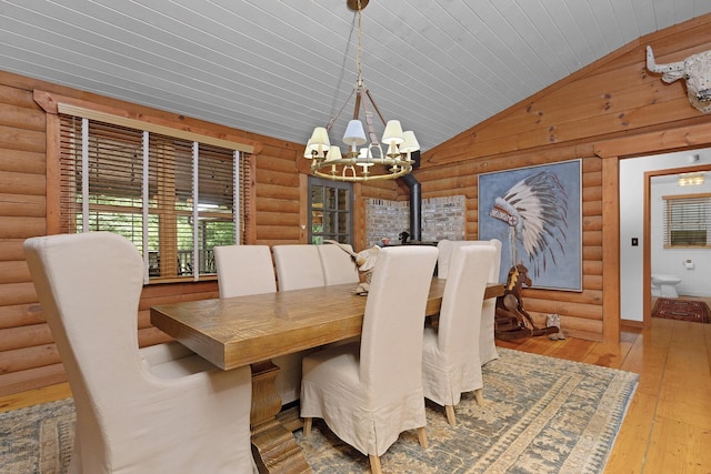 1261 S Cedar Ln, Chickamauga, GA 30707 - dining area with a chandelier, rustic walls, lofted ceiling, hardwood / wood-style flooring, and wood ceiling