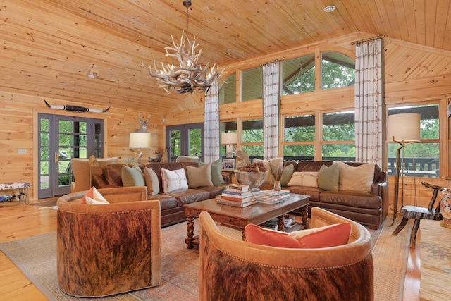 1261 S Cedar Ln, Chickamauga, GA 30707 - living area featuring french doors, wood walls, wooden ceiling, a chandelier, and wood finished floors