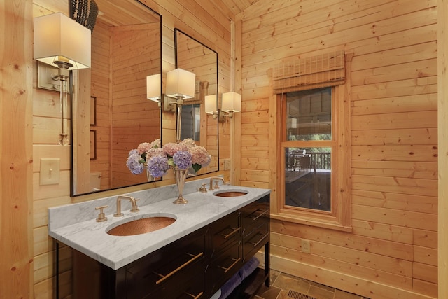 1261 S Cedar Ln, Chickamauga, GA 30707 - bathroom featuring wooden walls and double vanity
