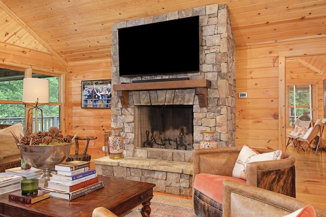 1261 S Cedar Ln, Chickamauga, GA 30707 - living area with lofted ceiling, wood finished floors, wooden ceiling, wood walls, and a fireplace