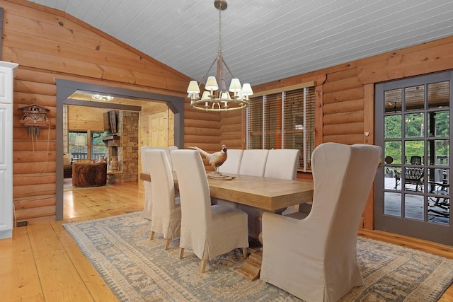 1261 S Cedar Ln, Chickamauga, GA 30707 - dining area with a chandelier, log walls, vaulted ceiling, light wood-style floors, and wood ceiling