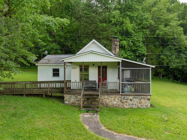 1261 S Cedar Ln, Chickamauga, GA 30707 - view of front of property with a chimney, a front yard, a forest view, and a porch