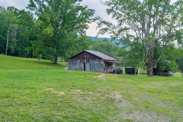 1261 S Cedar Ln, Chickamauga, GA 30707 - view of grassy yard featuring an outdoor structure