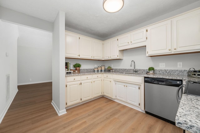 785 E Northfield Blvd, Murfreesboro, TN 37130 - kitchen featuring dishwasher, light wood-type flooring, and light stone countertops