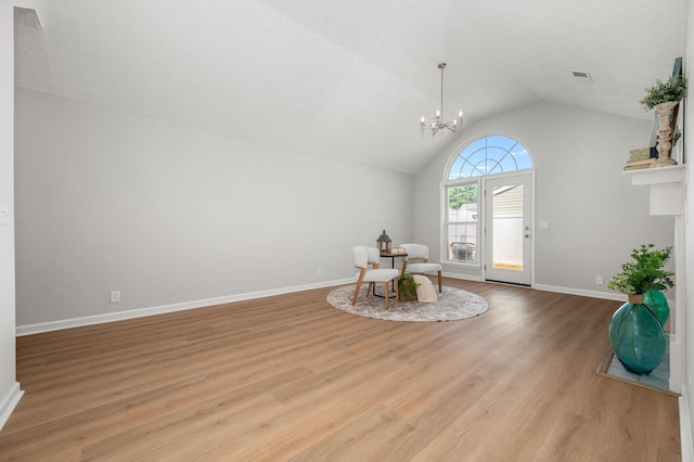 785 E Northfield Blvd, Murfreesboro, TN 37130 - unfurnished room with lofted ceiling, wood finished floors, and a chandelier